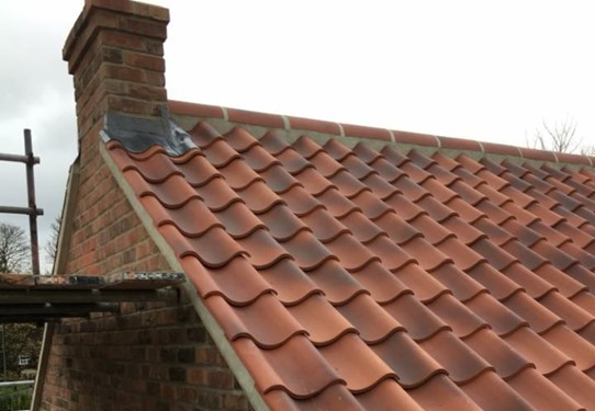 Reclaimed Terracotta Circular Roof Ridge Tiles 